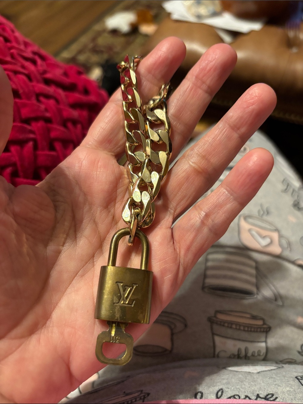 Louis Vuitton Gold-Tone Padlock Charm Key Holder and gold chain bracelet